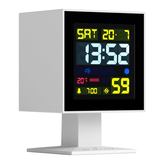 White LCD alarm clock with large illuminated digital time and status icons