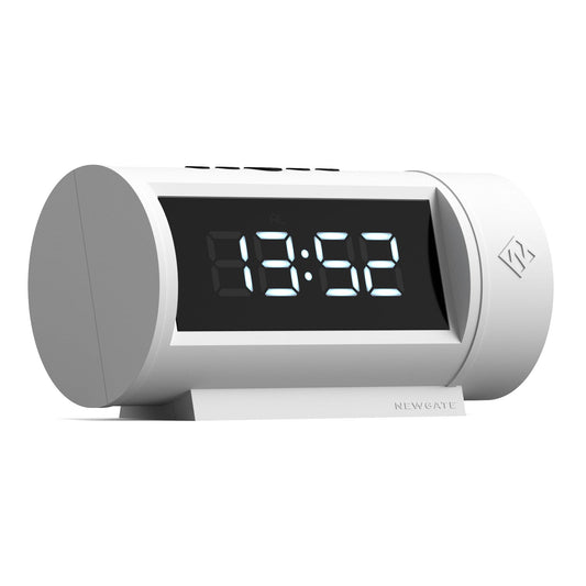 White LED alarm clock from the side, digital display showing 8:58