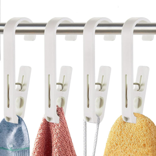 White clip hook hangers with clips for hanging socks, towels, or washcloths on a bar