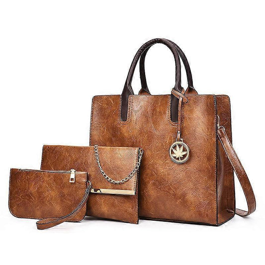 Tan leather tote set: large tote with coin purse and zip pouch.