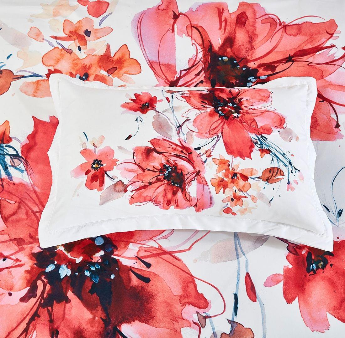 Queen floral quilt cover set close-up: white fabric with red and blue flower print