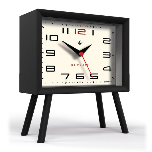 Black mantel clock with white dial, red second hand, Arabic numerals, quartz, on legs
