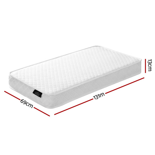 White quilted baby cot mattress with size markers and corner tag