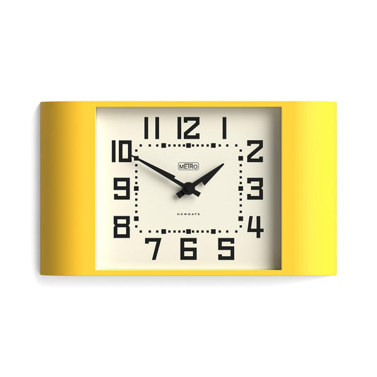 Yellow rectangular wall clock with white dial, black numerals, and black hands