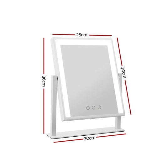 White vanity makeup mirror with control buttons and angled frame