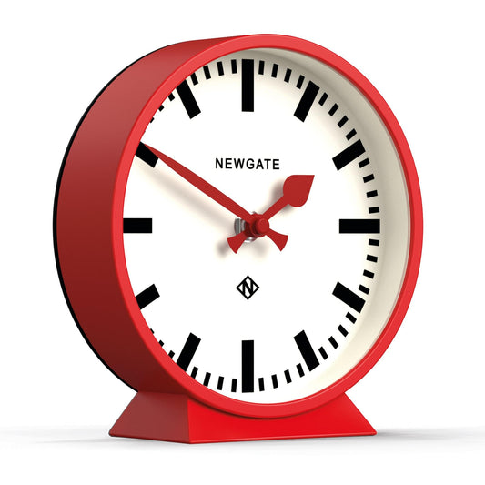 Red railway mantel clock with white dial, black hour marks, and red base