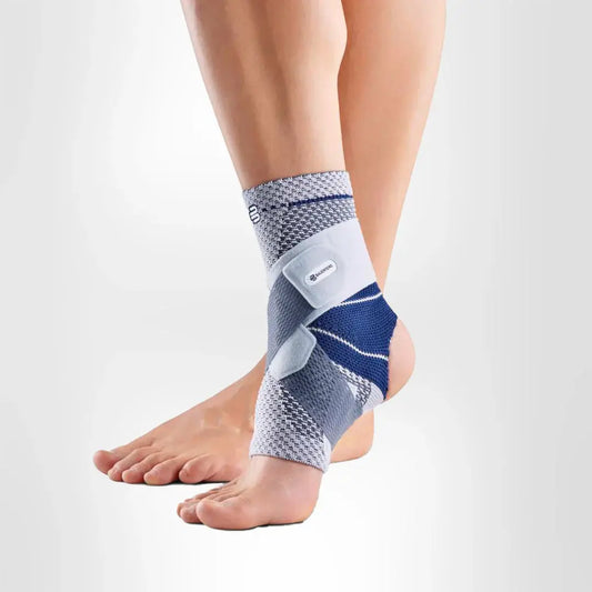 Open-heel ankle support in gray knit with navy cross-strap for stability