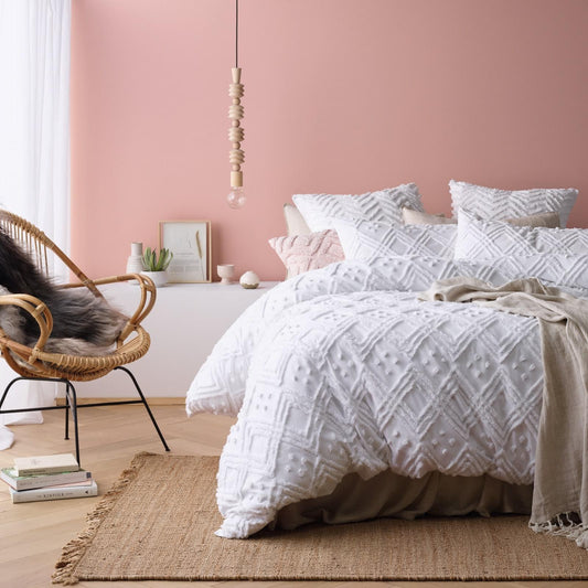 Cotton quilt cover set with white tufted medallion geometric pattern, including pillowcases