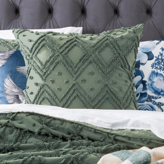 Sage green tufted quilt cover with raised medallion diamond pattern