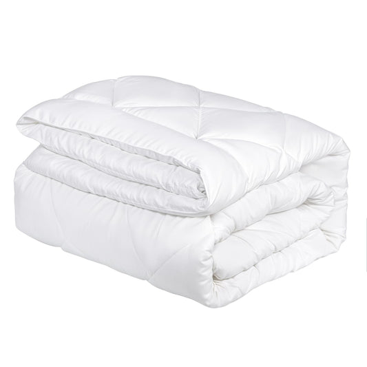 White quilt, folded, diamond-box stitching, queen size.