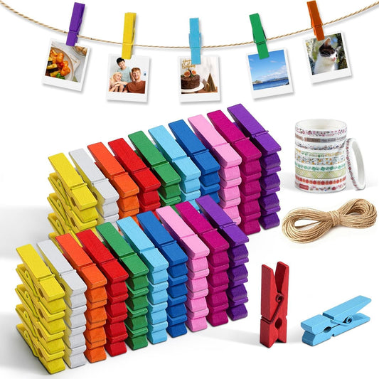 Colorful mini wooden clothespins clipped on jute twine, assorted sizes for crafts and photos
