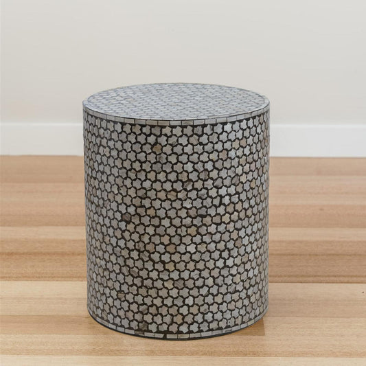 Black round side table with mother-of-pearl geometric inlay and flat top