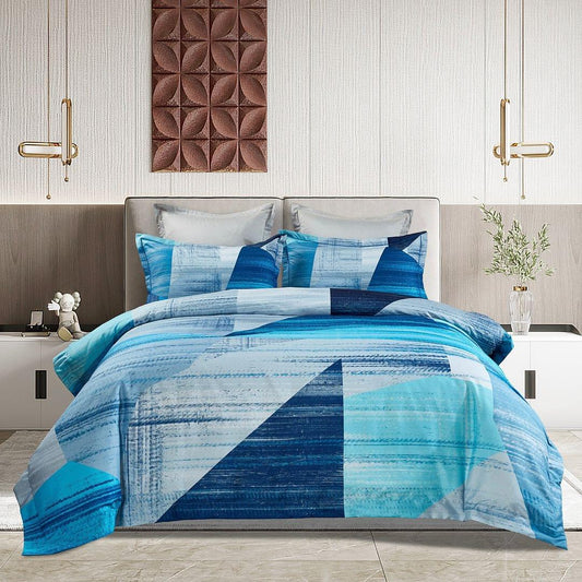 Blue and white quilt cover set with geometric block pattern and matching pillowcases