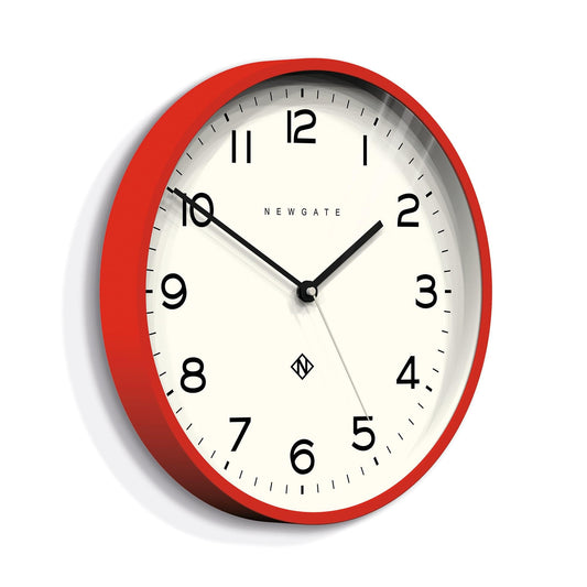 Red wall clock with cream dial, black hour markers and hands, Newgate logo