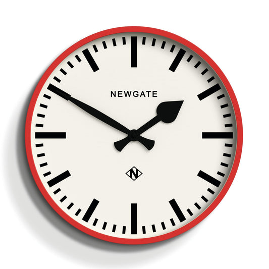 Red wall clock with white dial, black hands and rail-style minute marks