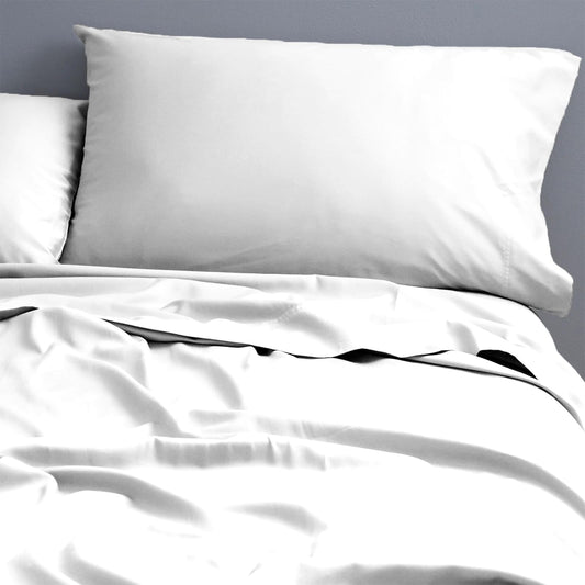 White cotton sheet set with matching pillow
