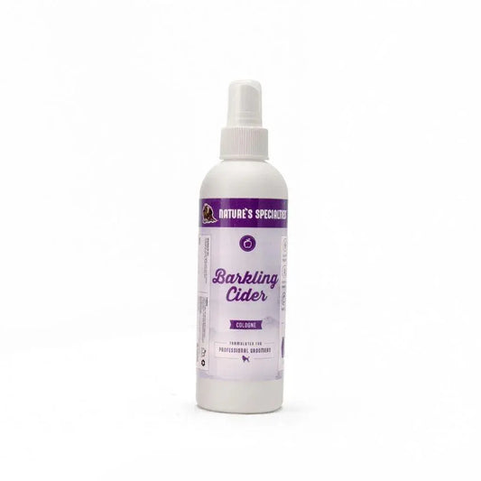 Cider cologne spray bottle with purple label and mist nozzle
