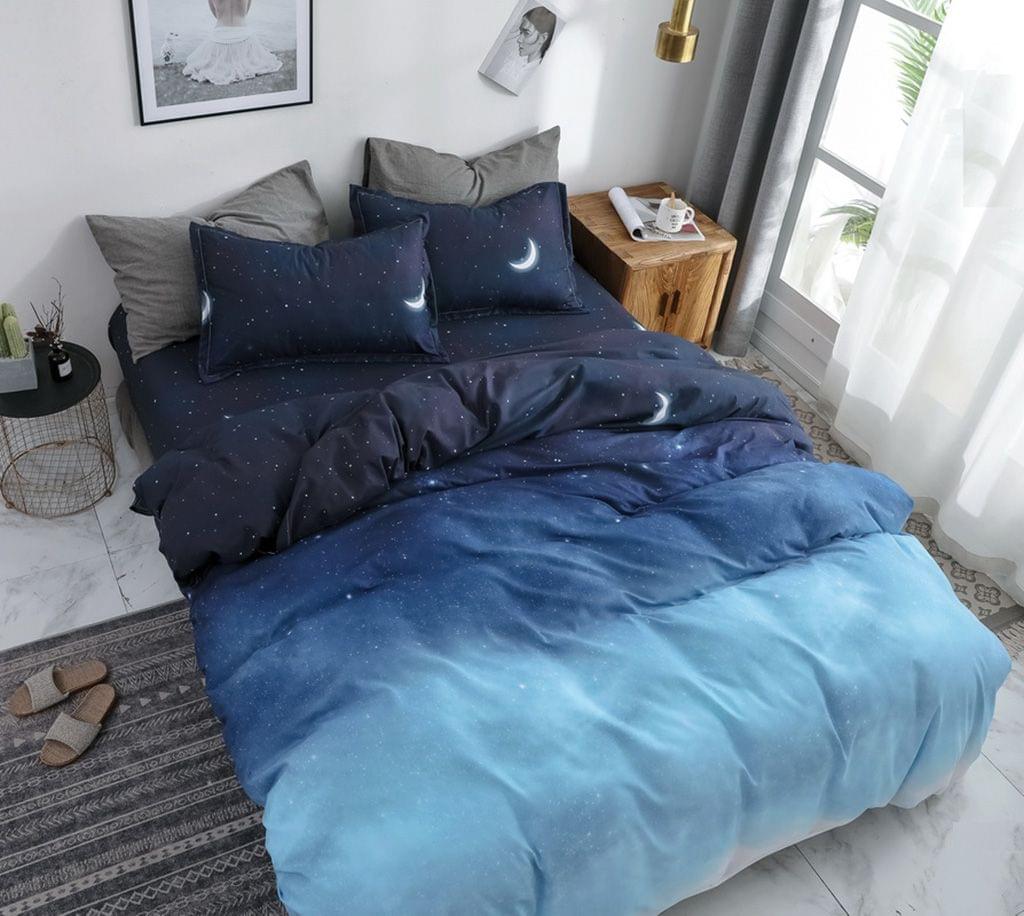 King duvet quilt cover set with navy star pattern and light blue solid panels