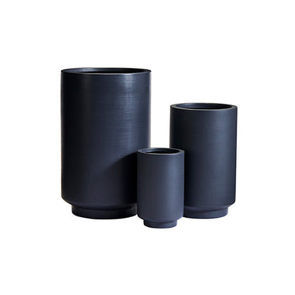 Dark blue cylindrical planter set with three pots, round openings and straight sides.