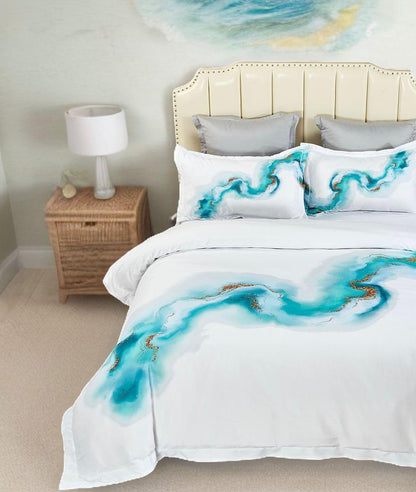 White queen duvet cover with teal marble edge print and matching pillow shams