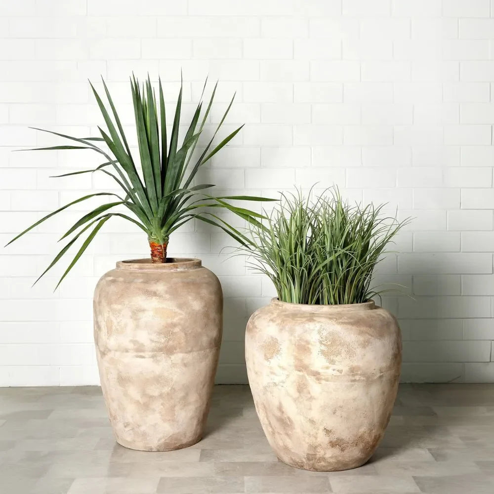Two large stone-textured planter jars with flared rims, warm beige mottled finish.
