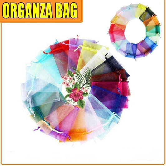 Assorted sheer organza gift pouches arranged in a circular display