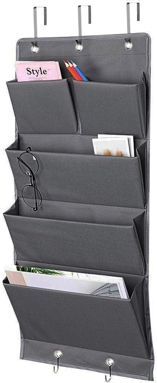 Grey over-door hanging storage organizer bag with five fabric pockets and top loops