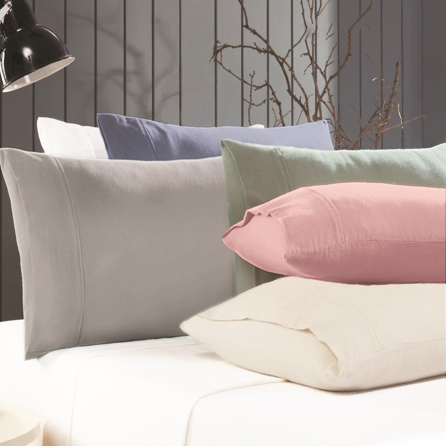 Kids flannelette sheet and pillowcases in light ash grey with cream and pink pillows
