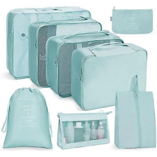 Mint green waterproof packing cube set with clear mesh panel and zip pouch