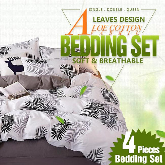 Bedding set featuring white base with black palm leaf pattern and gray flat sheet