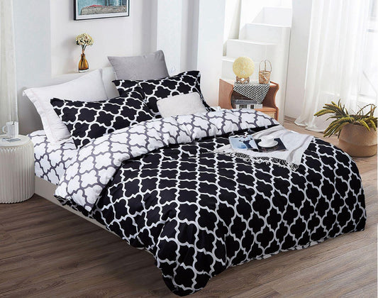 Super king quilt duvet cover set with black and white quatrefoil pattern on bedding