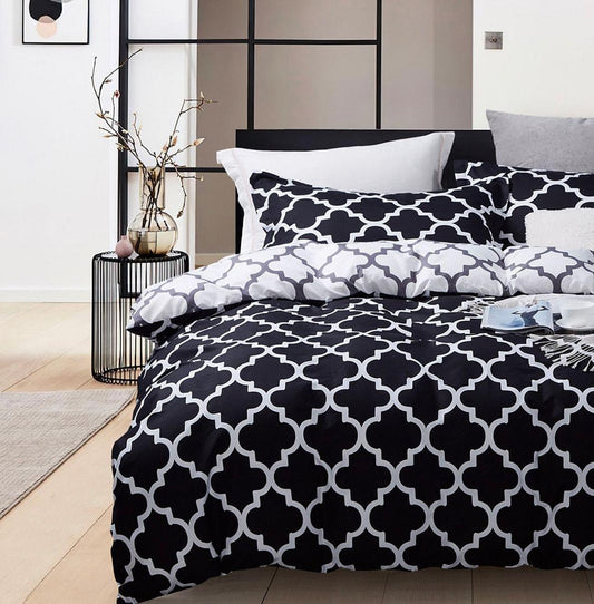 Super king bedding set featuring black and white quatrefoil duvet cover with matching pillow