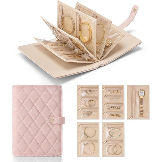 Quilted travel jewelry organizer binder in pink with clear zipper pockets and divider pages