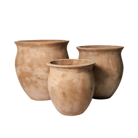Set of three beige planters with flared openings and a textured finish.