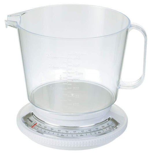 Kitchen jug scale with transparent jug and integrated round measurement dial