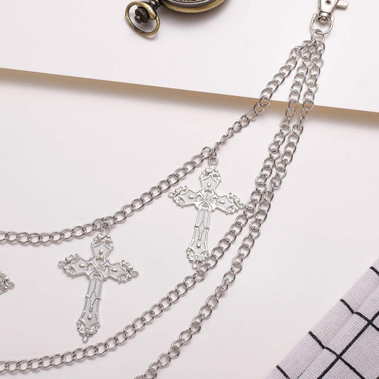 Silver-tone layered chain with dangling cross charms and ring clasp