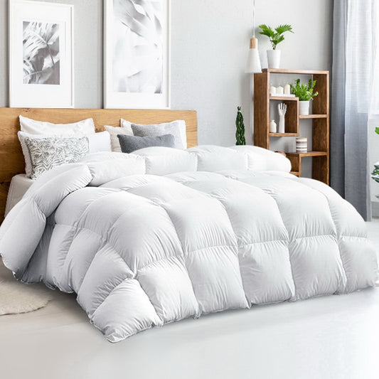 White down quilt with baffle channels and matching pillows on bed