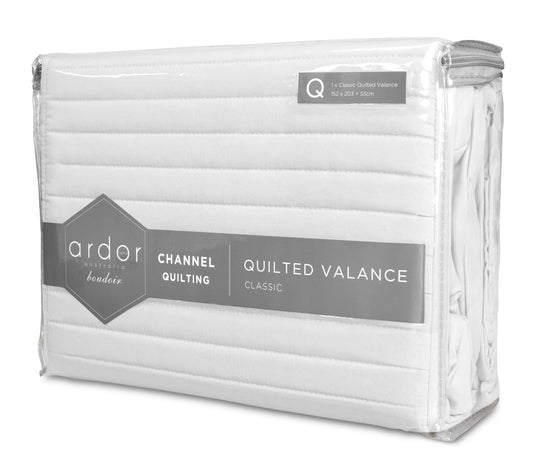 Quilted valance package in clear plastic wrap with label on white background