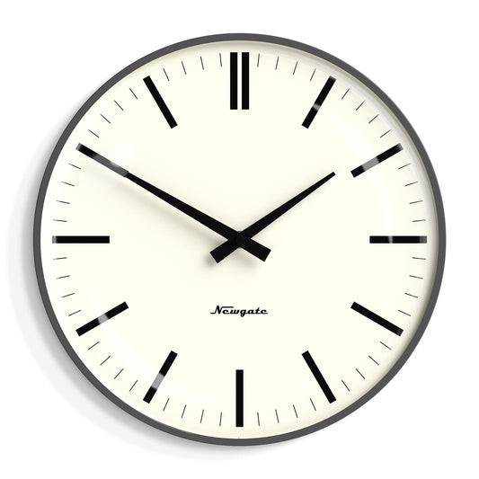 Newgate wall clock with black bezel, cream dial, bold black marker hours and cross hands