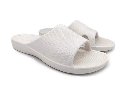 White unisex arch support slide sandals with textured footbed and wide strap.