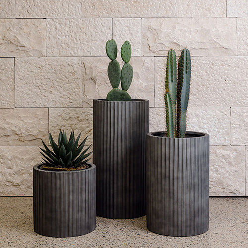 Charcoal ribbed planters, three cylindrical pots with vertical ridges for succulents