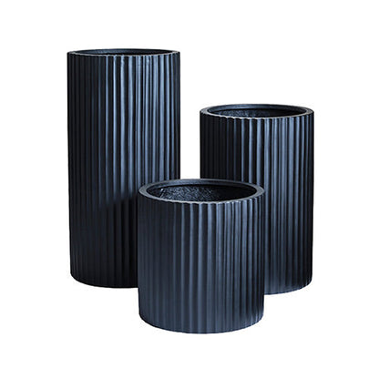 Ribbed plant pot set in concrete grey with three cylindrical planters