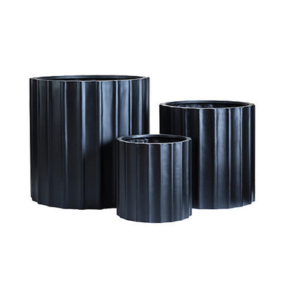 Dark ribbed planter set, three cylindrical pots with vertical grooves