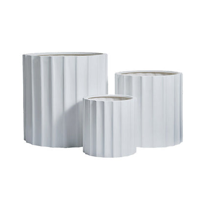 White ribbed planter set, three cylindrical pots with vertical ridges