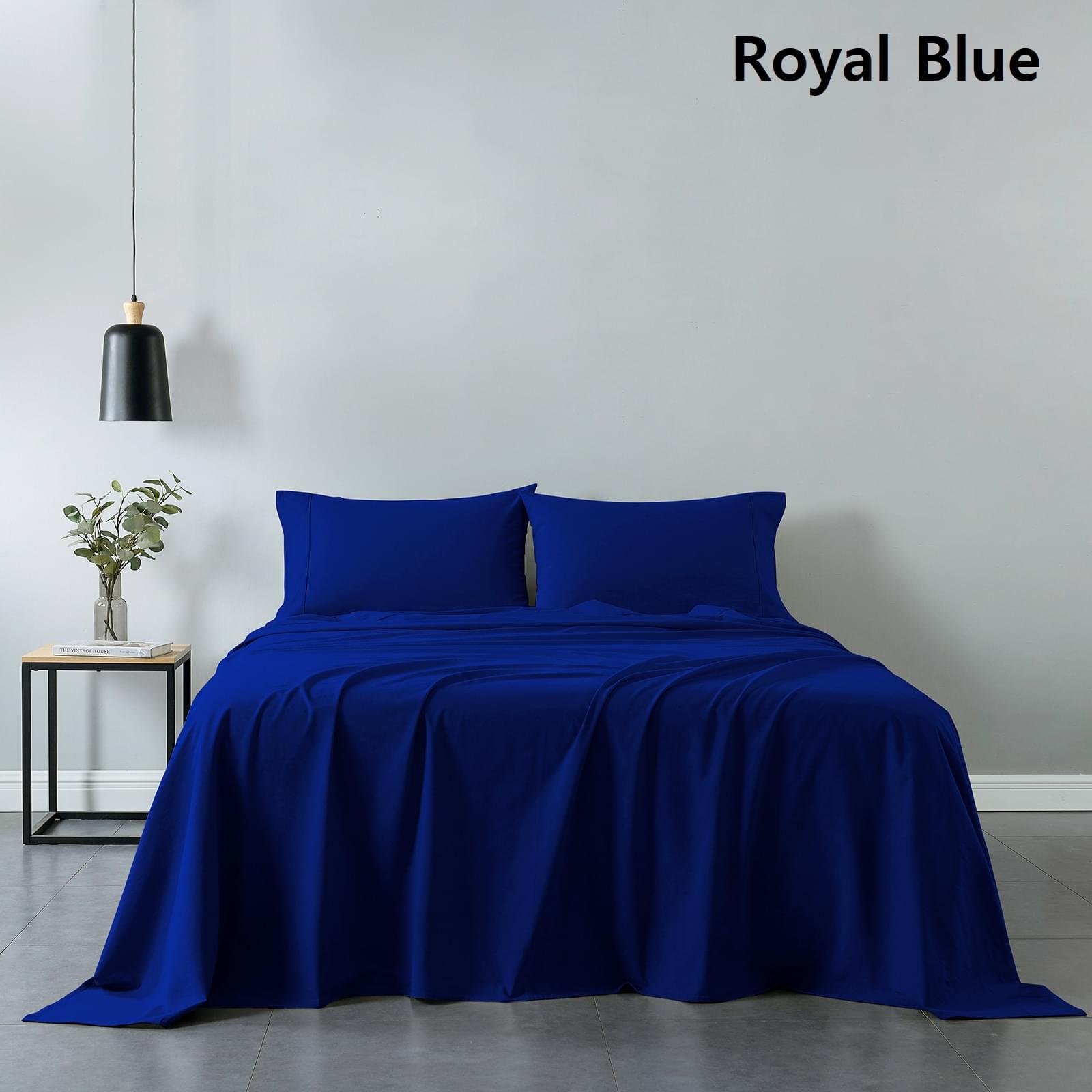 Royal blue fitted sheet and bedspread with two matching pillows