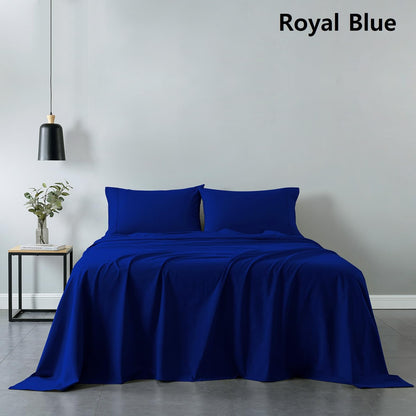 Royal blue fitted sheet and bedspread with two matching pillows