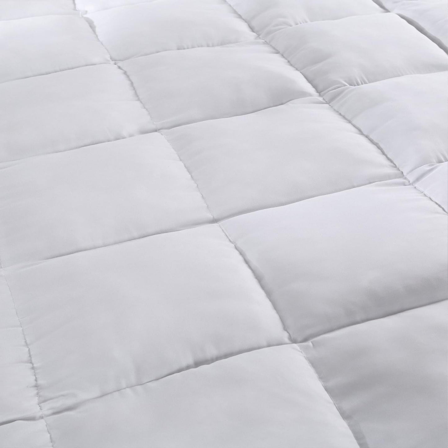 White quilted mattress pad topper cover, stitched channels