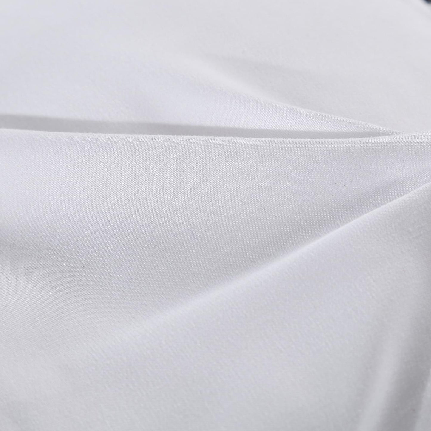 White fabric mattress pad topper cover, smooth woven surface