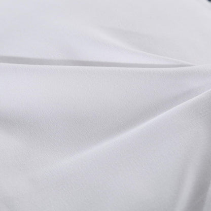 White fabric mattress pad topper cover, smooth woven surface