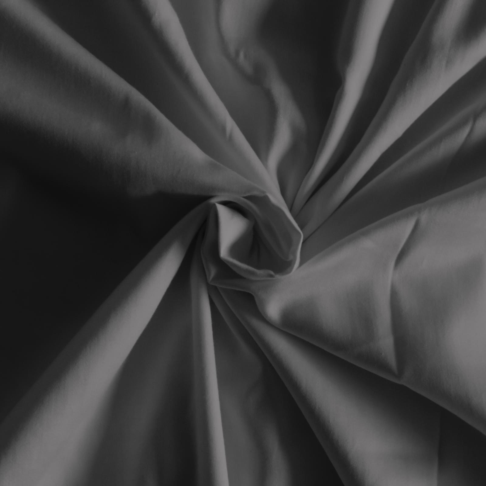 Pewter sheet fabric close-up with gathered folds and soft sheen